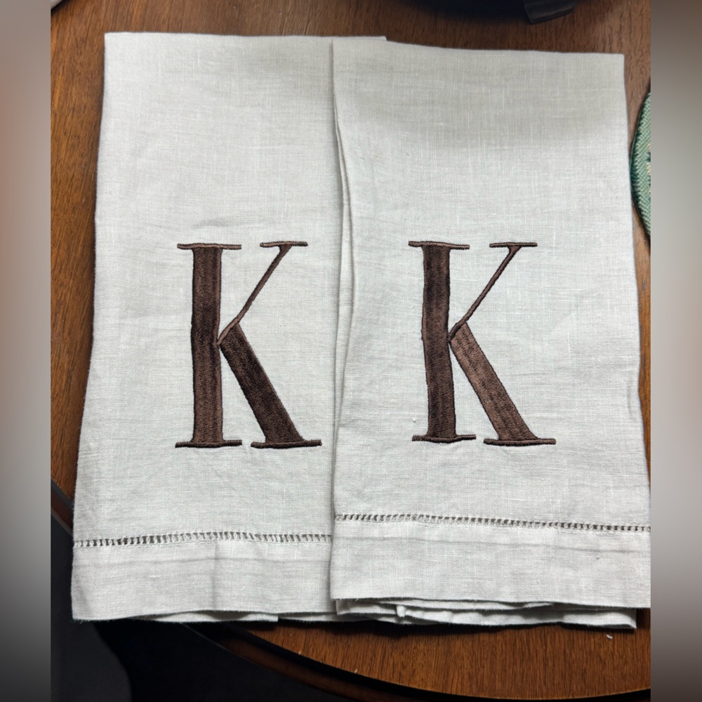 Two EUC “K” monogram brown & beige embroidered finger towelettes by Mudpie